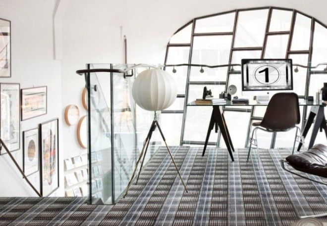 Оригинальное ковровое покрытие в стильном интерьере комнатыстудии