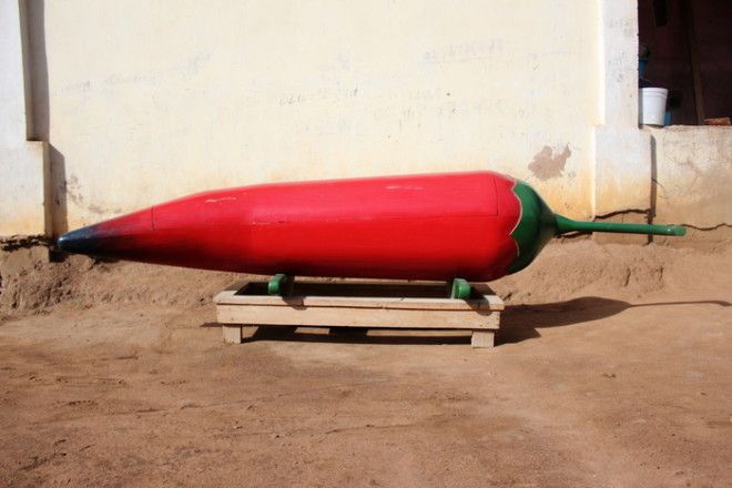 Гроб в форме перца. | Фото: huffingtonpost.com. Гроб в форме перца Фото huffingtonpostcom